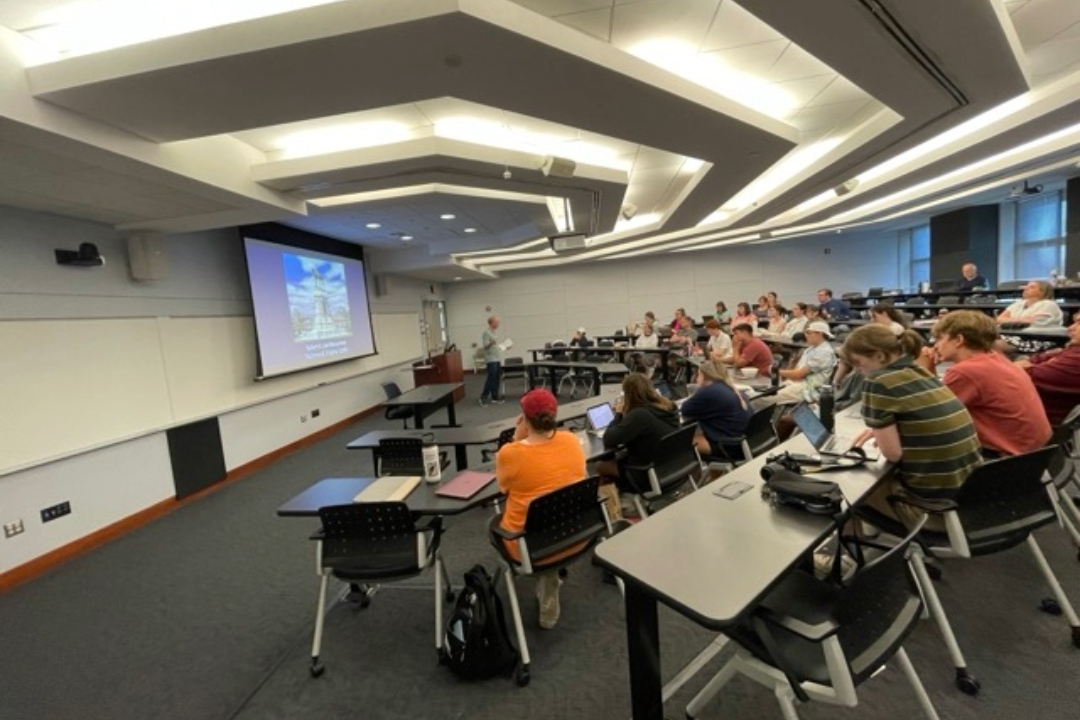 People sitting in a lecture hall 