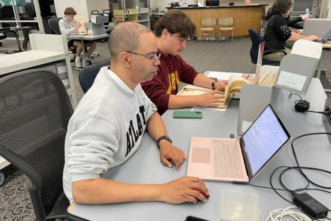 Two people researching